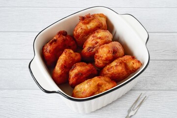 Gogodo or Frid bananas on a plate. Pisang goreng gogodo