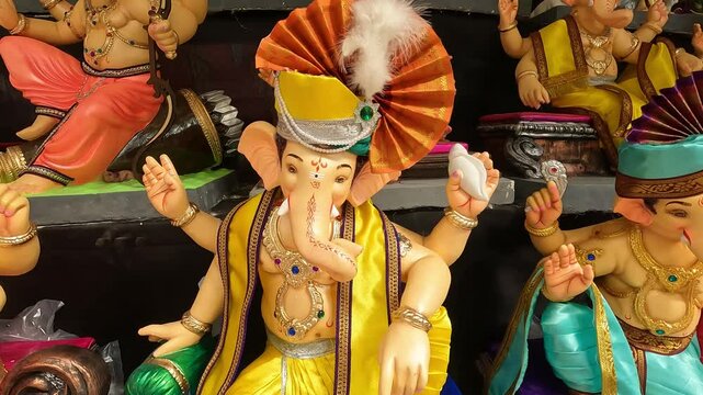 06 September 2024, Newly made idols of the God known as Ganesha or Ganapati for sale at a shop on the eve of Ganesh festival in Pune, India.