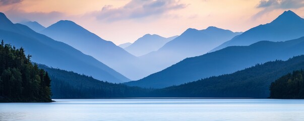 Mountain landscape with serene lake at sunrise