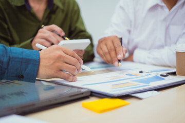 Close-up of a businessman in a meeting at the office discussing topics related to digital marketing...