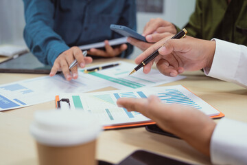 Close-up of a businessman in a meeting at the office discussing topics related to digital marketing...