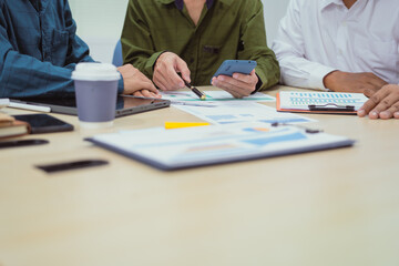 Close-up of a businessman in a meeting at the office discussing topics related to digital marketing...