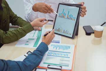 Close-up of a businessman in a meeting at the office discussing topics related to digital marketing...