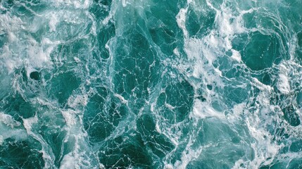 Fototapeta premium Blue-green marble with white veins and silver accents, resembling ocean waves in texture. No people. No logo.