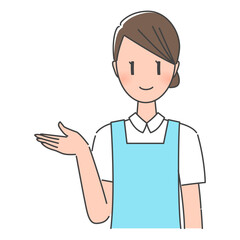 ブルーのエプロン姿、笑顔で案内する歯科助手・歯科衛生士の女性スタッフ