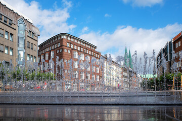 Luebeck, Germany, 2024 - The historical city center with a water fountain in summer