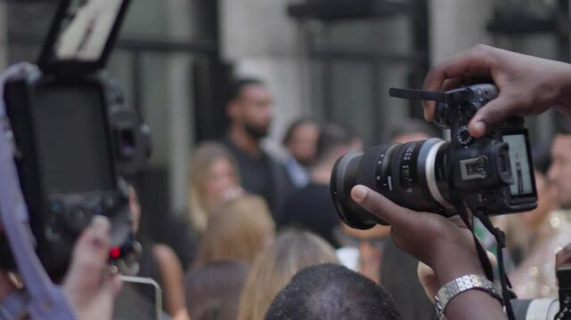 Paparazzi, cameras filming the carpet, Slow motion, fashion show