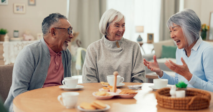 Laugh, tea and senior friends at table for funny conversation, snacks and retirement together in house. Group, party and man speaking with elderly women smile for breakfast, communication and bonding - Powered by Adobe