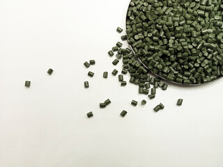 green masterbatch raw material, green polymer granules cold cut type, inside laboratory pantry...