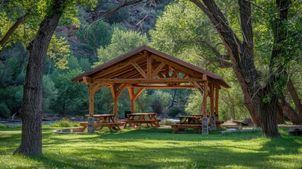 Pavilions: Sheltered, open-air structures with built-in picnic tables. They offer a shaded environment for group gatherings, events, and barbecues, ideal for outdoor activities.
