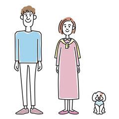 おしゃれな若い夫婦と可愛い子犬