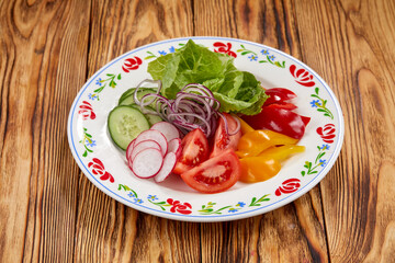 fresh vetetables on the plate, top view