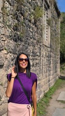 Naklejka premium woman with sunglasses smiling