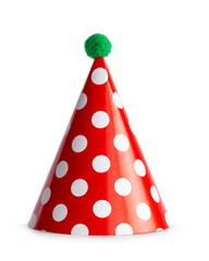 Classic red party hat with white polka dots and green pompom standing isolated  on white background