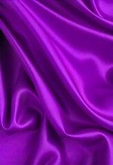 Obraz premium Smooth flowing purple satin fabric with soft wavy. flowing purple satin with soft folds and highlights.