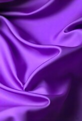 Obraz premium Smooth flowing purple satin fabric with soft wavy. flowing purple satin with soft folds and highlights.