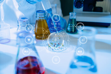 Scientist mixing chemical liquids in the chemistry lab. Researcher working