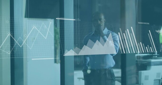 Animation of financial data processing over african emerican businessman in office