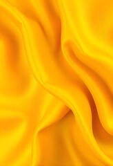 Fototapeta premium Abstract yellow background luxury cloth or liquid wave. Flowing yellow satin with soft folds and highlights.