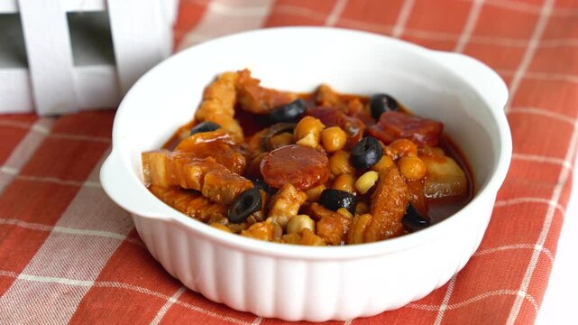 ox tripe in tomato sauce with chick peas and olives also known as callos