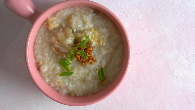 ox tripe congee or also known as goto in colorful bowls