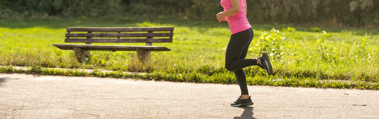 Jogging woman running in park