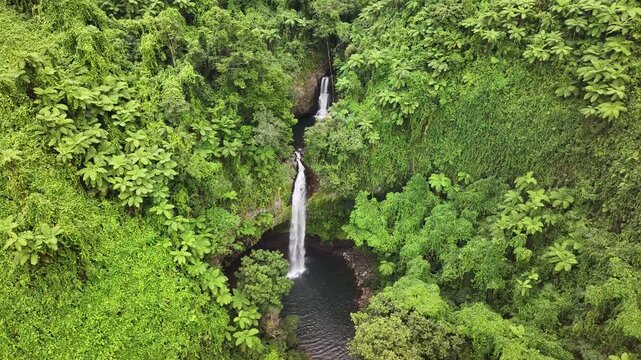 Bouma Waterfalls in jungle forest in Fiji, Taveuni Island. Hidden gem, travel destination. Drone view