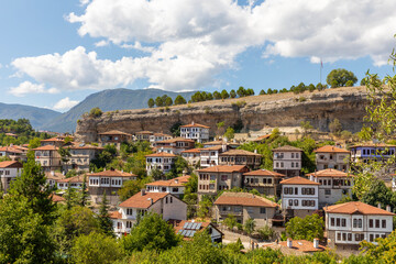 Naklejka premium Traditional Ottoman Houses in Safranbolu. Safranbolu UNESCO World Heritage Site. Old wooden mansions turkish architecture. Safranbolu landscape view.