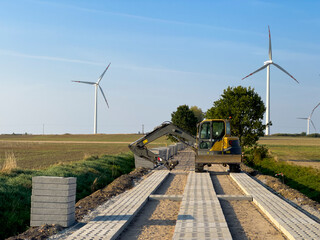 Process of making a new road with concrete slabs as a surface.