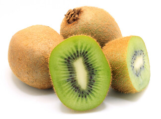 Kiwi whole and half with shadow. Juicy fresh fruit. Summer photo. Side view