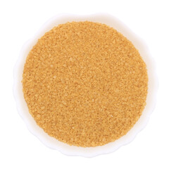 Brown cane sugar in a transparent round bowl. Sweetener