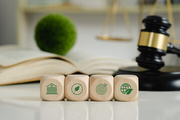 Wooden cubes with a decarbonization icon and green icon.Law for environmental regulation.Sustainable environment concept.