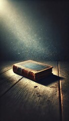 An old dusty book under a beam of light