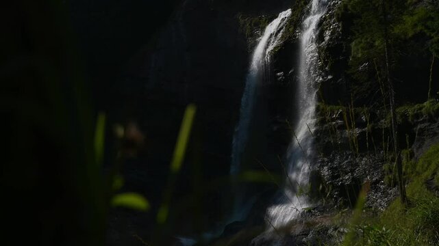 Cascade du Rouget Falls with powerful flowing water from rushing river in Sixt-Fer-&agrave;-Cheval National Park