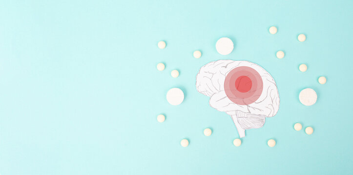 Brain with pills, Alzheimer awareness day, dementia diagnosis, Parkinson disease, memory loss disorder,  damaged mind 
