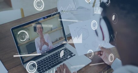 Animation of data processing over schoolboy learning online with female teacher on laptop screen - Powered by Adobe