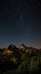 High-definition abstract mobile wallpaper backgrounds showcasing mountain ranges dotted with stars, with tranquil night scenes enhancing the screen.