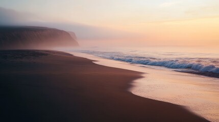 Fototapeta premium Serene beach at sunrise with gentle waves