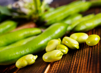 Soybean on wooden table, raw beans