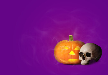 Spooky glowing jack o'lantern and scary skull on purple background, space for text. Halloween celebration
