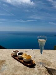 glass of champagne on the beach