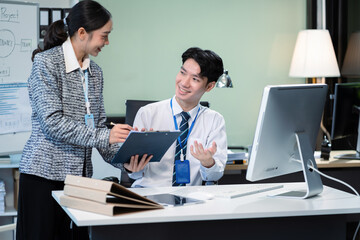 Businessmen team or financial data analysts working with tablets and laptop computers and data graphs together. Plan to analyzing projects in the office.