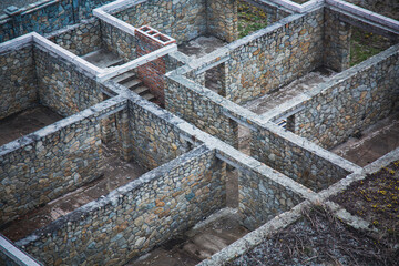 Stone basement wall maze corridor