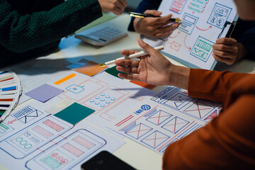 ui designer brainstorming about mobile app interface wireframe design with customer breif and color...