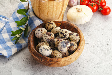 Raw quail eggs in the bowl