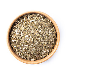 Traditional yerba mate in a bowl isolated on white background. Top view. Copy space