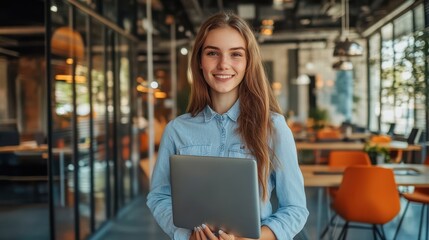 Fototapeta premium The Happy Young Woman Holding Laptop