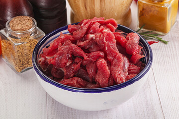 Raw beef meat - sliced strips