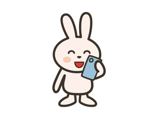 スマホを見てご機嫌なうさぎさんのイラスト