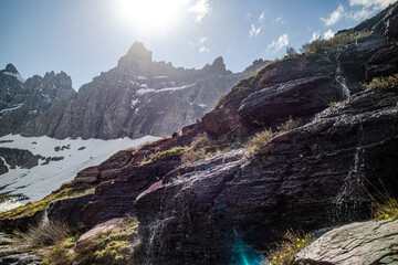 Iceberg lake at the Glacier national park, Montana, USA. Hiking trail is the most beautiful scenery of the u shape valley and covered with snow.
